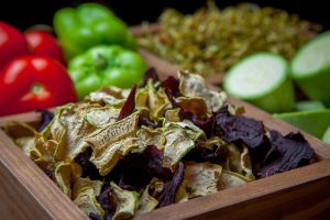 side view close up dried vegetables in wooden box 1